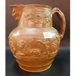 19th Century salt glazed stoneware jug, the body applied with an armorial flanked by two lions and a