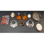 Collection of costume jewellery including a pair of raw amber drop earrings and a pair of Mexican