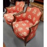Pair of 20th Century French walnut upholstered fauteuils.