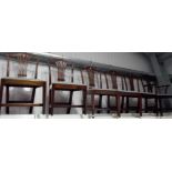 Set of six George III style mahogany dining chairs with pierced splats over a stuff-over seat,