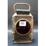 Vintage automobile brass and tin plate rear light with glass circular lens and bubbled glass panels,