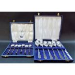 Set of six gilded coffee bean spoons with foliate decorated enamel bowls, boxed; together with a
