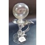 18th Century glass lace makers oil lamp with baluster hollow stem, the handle with thumb piece and