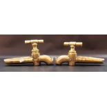 Pair of 19th Century brass barrel taps, length 9.75in.