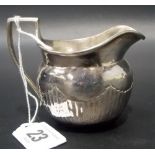 Victorian milk jug of half fluted form, London 1878, weight 1.80oz approx.