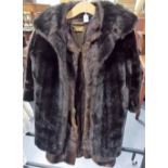 Vintage ladies three quarter length fur coat by Griffin & Spalding, together with a faux fur coat (