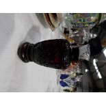 Small Chinese Cinnabar lacquer baluster vase, foliate decorated, carved wood stand, height 4 in.