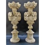 Pair of grey veined alabaster carved sectional urn ornaments carved with fruiting vine, height 29.