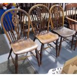 Three 19th Century elm wheel and stick-back kitchen chairs