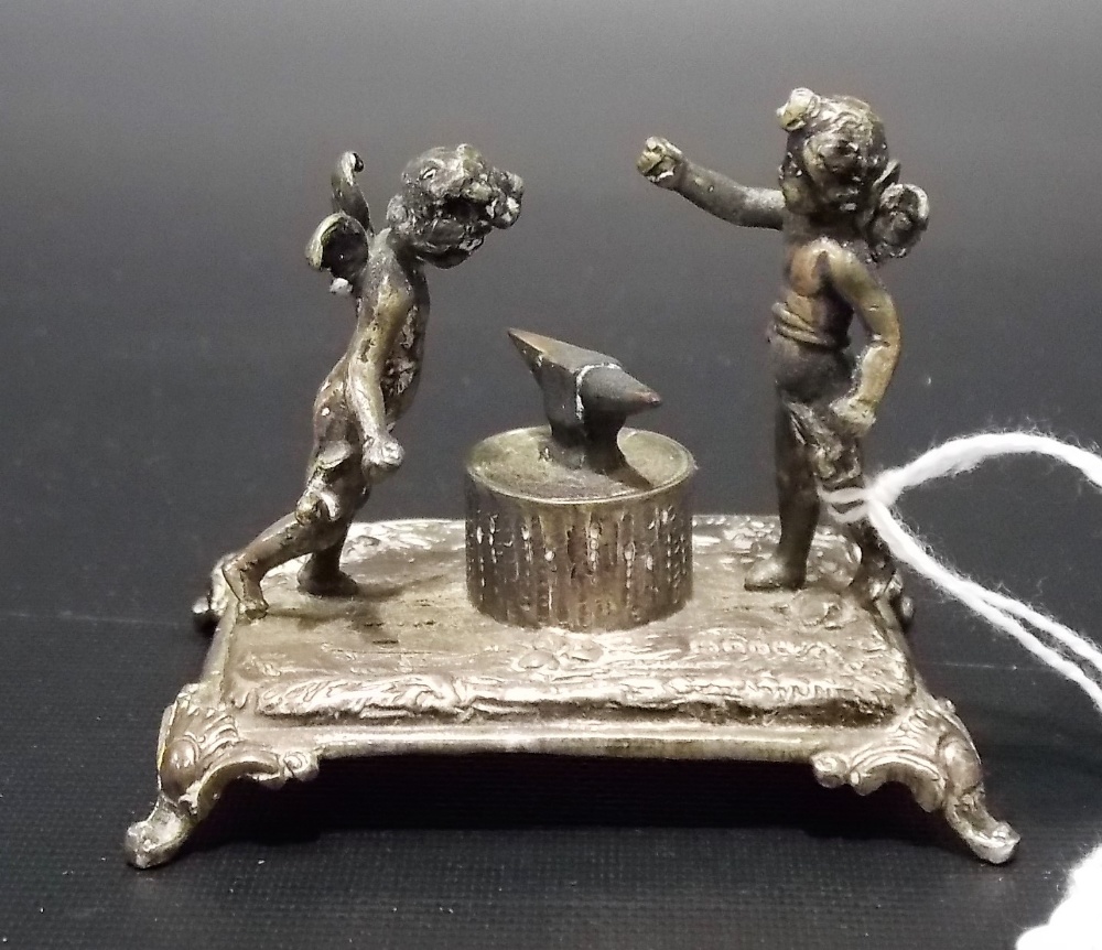 Victorian export silver miniature group depicting two cherubs in front of an anvil, maker GS FS,