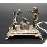 Victorian export silver miniature group depicting two cherubs in front of an anvil, maker GS FS,