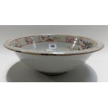 17th Century Chinese export famille rose bowl, decorated with four figures within a garden with