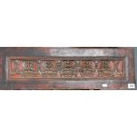 Burmese rectangular carved panel, the centre rectangular reserve red painted, gilded and carved with