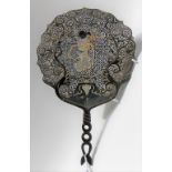 Oriental horn pierced hand fan painted and gilded to both sides with a stylised figure and with