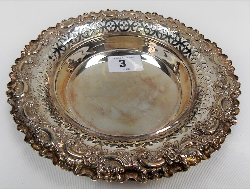 Victorian silver circular dish with foliate scroll embossed and pierced rim, maker SE WS,