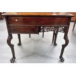 Chinese hard wood centre table, the rectangular top over a panelled frieze with pierced and carved
