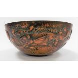 Newlyn copper bowl the exterior embossed with four stylised fish and with planished decoration,