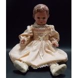 Large celluloid doll by Rhienische Gummi Fab, turtle mark to the back, height 28in.