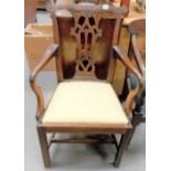 George III mahogany elbow chair with shaped and carved top rail over a pierced vase splat and drop-