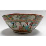 Cantonese famille rose bowl, typically decorated with reserves of figures and birds amongst foliage,