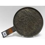 Japanese circular bronze hand mirror, one side cast with characters and cranes amongst foliage,