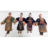 Four 19th / 20th Century Chinese composition dolls wearing court silk embroidered robes, height of