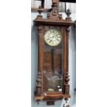 Vienna two train wall clock with walnut case, height 45in.