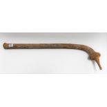 A Fijian Totokia war club with oval carved head tapering to a point, length 29in