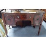 19th Century mahogany bow front sideboard with central drawer flanked by cupboard doors on square