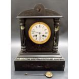 Black slate and marble two train mantel clock with French movement, height 13.25in.