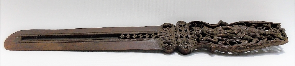 An Indian carved and pierced wood page turner, the handle carved to both sides with female - Image 2 of 2