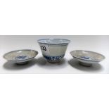 Chinese blue and white tea bowl, saucer and lid, underglaze decorated with bands of auspicious