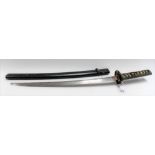 Japanese short sword with shagreen bound handle with two Menuki fittings and pierced steel Tsuba,