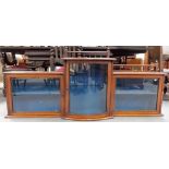 Edwardian mahogany strung wall hanging display cabinet, the central bow front cabinet flanked by two