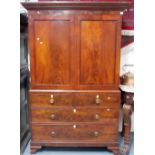 George III mahogany linen press, the moulded dentil cornice over a pair of cupboard doors