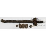 A Chinese sword formed out of coins and bound with string, length 18in overall