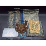 Box containing a selection of Chinese silk embroidery.