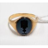 19th Century gold signet ring with armorial stone carved matrix, weight 3.8g approx