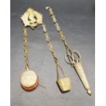 19th Century brass embossed chatelaine with scissors, pin cushion and thimble holder.