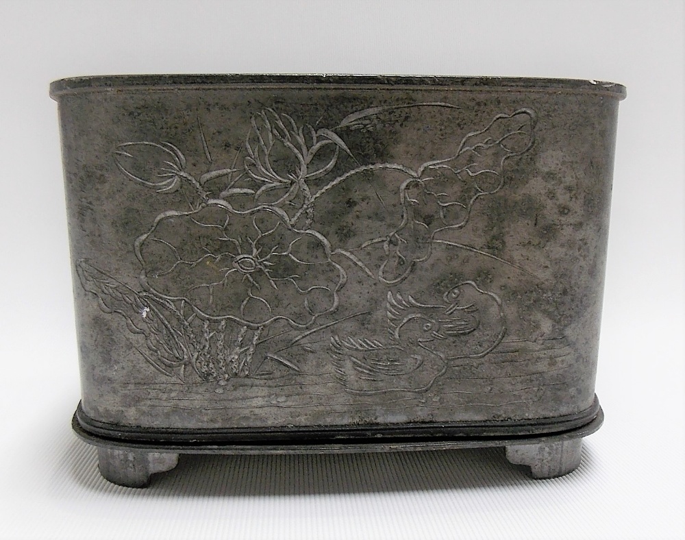 Chinese pewter rectangular box, the lid and sides inscribed with character writing, one side incised