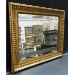 19th Century gilt wood and gesso rectangular bevel edged wall mirror, width overall 32in.