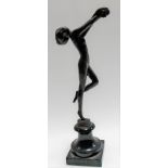 Early 20th Century bronze model of a nude girl dancer upon turned slate base, height 9in