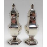 Pair of Victorian silver hexagonal section pedestal salt and pepper shakers, Birmingham 1900, weight