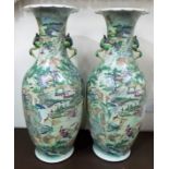 Good pair of Chinese famille verte vases, both with twin bird handles, both painted with hunting