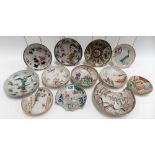 Collection of Chinese famille rose saucer dishes, most with damage.