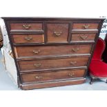 Edwardian mahogany chest of drawers by James Shoolbred & Co, the moulded rectangular top over a