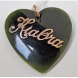 New Zealand spinach green jade yellow metal mounted heart shaped pendant with applied gold lettering