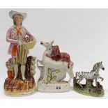 Victorian Staffordshire Pottery flatpack group depicting a horse with a lion on its back, height