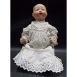 Armand Marseille bisque porcelain dream baby doll, the head marked no. 351/8k, height 22in.