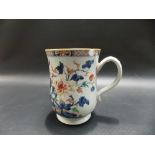 Chinese export mug underglazed blue decorated & painted with coloured enamels depicting a trellis